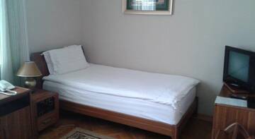 Фото номера Стандартный одноместный номер Гостиница Pyramid Hotel г. Находка 5